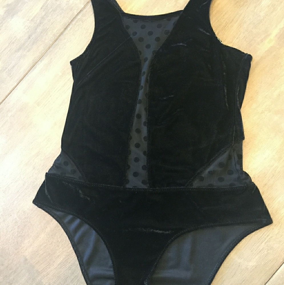 Women's black velvet/mesh body suit.